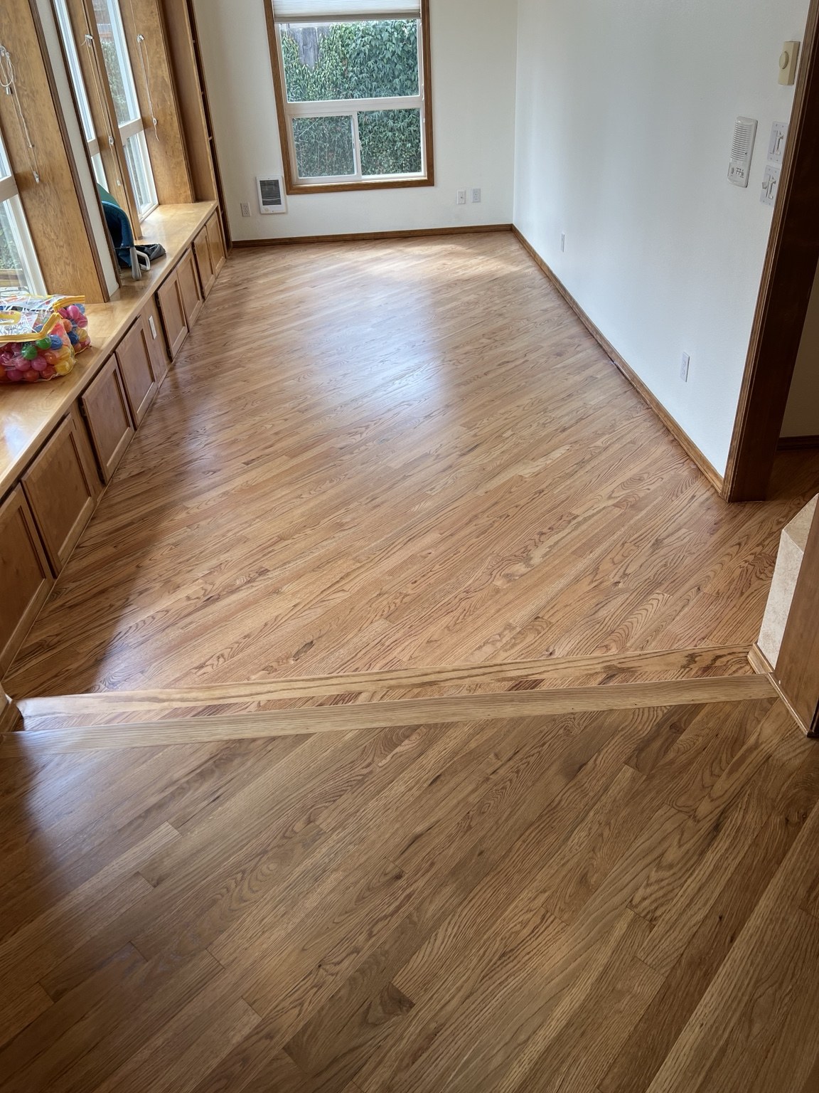 Hardwood flooring with a wood step transition